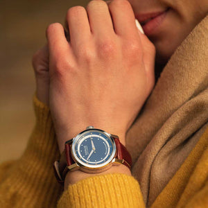 woman with yellow jumper wearing a marloe watch company tay marine automatic manual watch